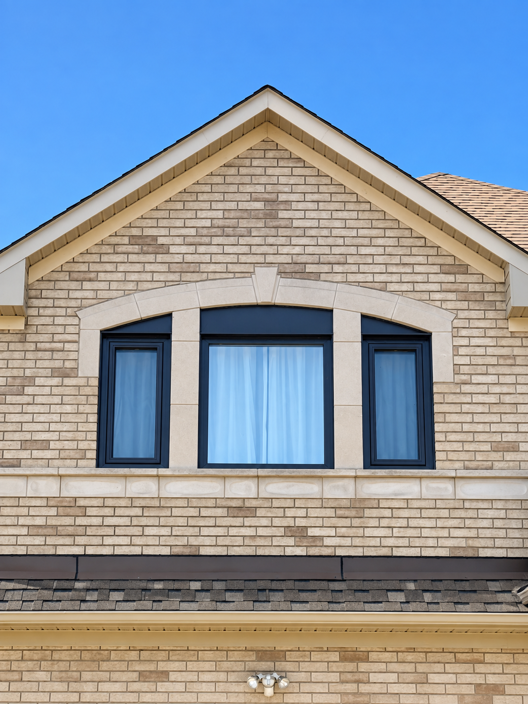 Window composition framed by brick architecture